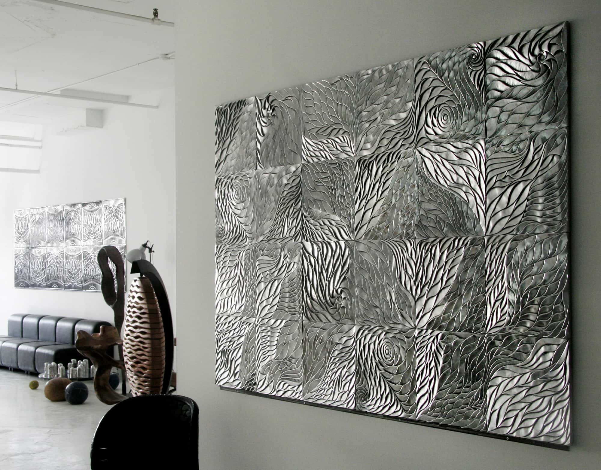sand-casted and hand-polished recycled aluminium wall art